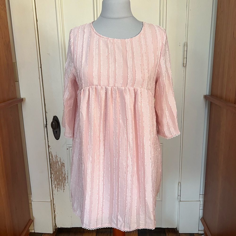 Baby doll dress or tunic! Never worn, no tags. Blush pink color. Runs small